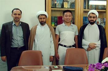 Chinese reporter converts to Shia Islam at Imam Ridha holy shrine